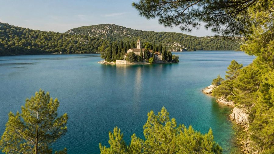 AI-generated illustration: a wooded island with a monastery in a lake on Mljet